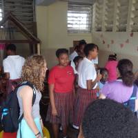 Viewing student projects at Collège Catts Pressoir School in Port au Prince, Haiti